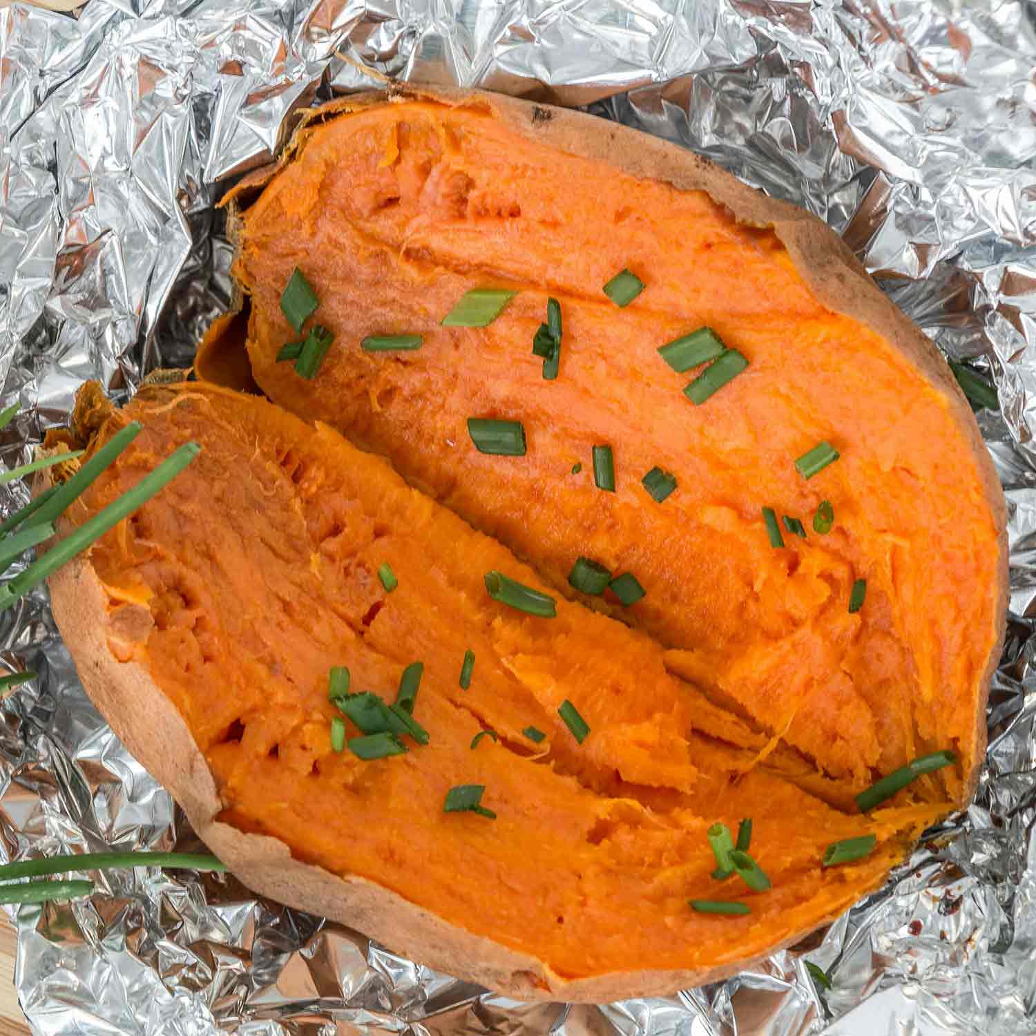Baked sweet potato with quinoa and tahini | Love Veg